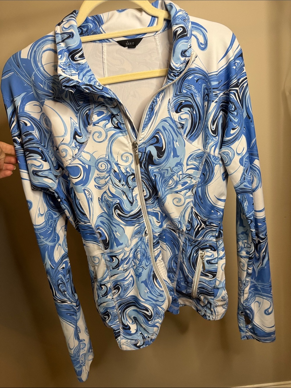 Skea Marble-Print Blue Zip Jacket with 3 zip pockets and thumb holes